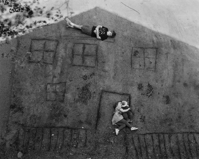 Laura and Brady in the Shadow of Our House (1994) by Abelardo Morell